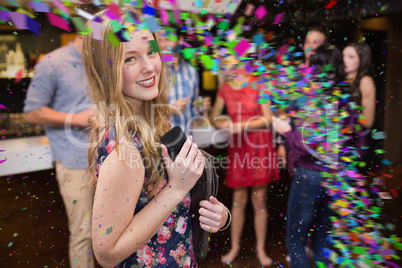 Composite image of pretty blonde smiling at camera