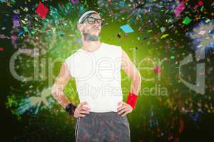 Composite image of geeky hipster posing in sportswear