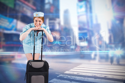 Composite image of pretty air hostess smiling at camera