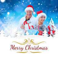 Composite image of couple with shopping bags and gifts