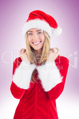 Pretty santa girl smiling at camera