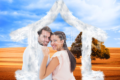 Composite image of attractive young couple smiling at camera