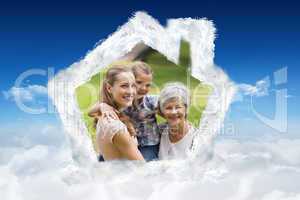 Composite image of grandmother mother and daughter with family i