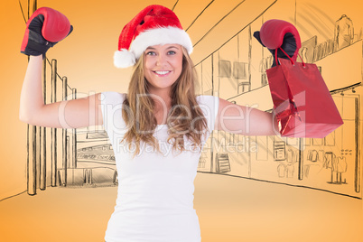 Composite image of festive blonde with boxing gloves and shoppin