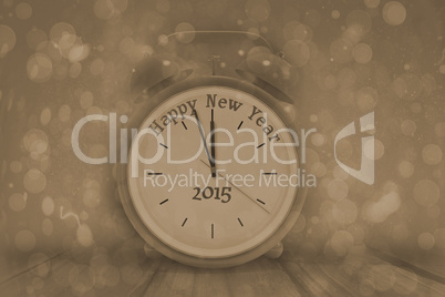 Composite image of happy new year in red alarm clock