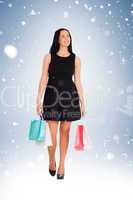 Woman walking with shopping bags
