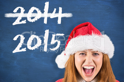 Composite image of festive redhead shouting at camera