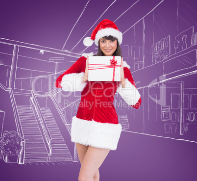 Composite image of sexy santa girl holding gift