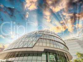 London City Hall at dusk with surrounding buildings