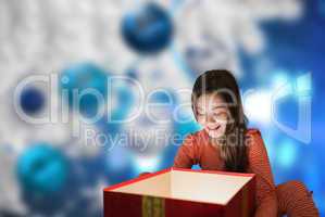 Composite image of little girl getting gift