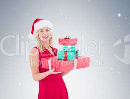 Pretty blonde hoding christmas gifts