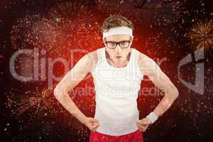 Composite image of geeky hipster posing in sportswear