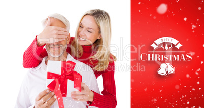 Composite image of smiling woman covering partners eyes and hold