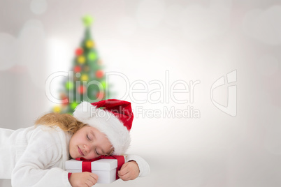 Composite image of cute girl with gift