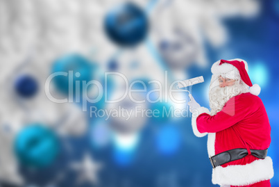 Composite image of happy santa claus painting