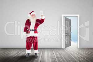 Composite image of jolly santa waving at camera