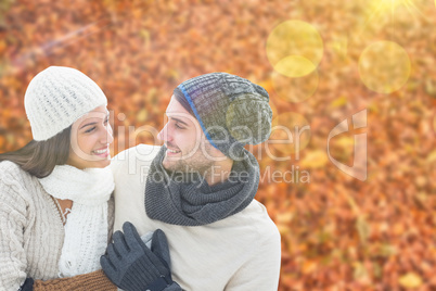 Composite image of young winter couple