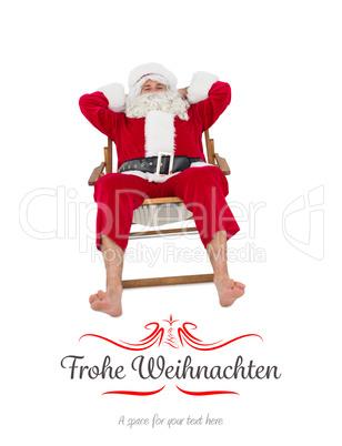 Composite image of happy santa relaxing on deckchair