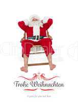Composite image of happy santa relaxing on deckchair