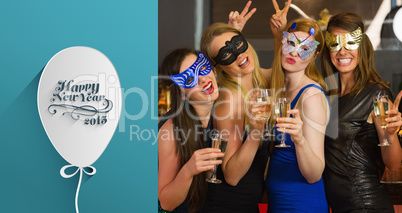 Composite image of attractive women wearing masks holding champa