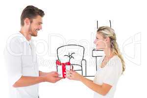 Composite image of young couple with gift