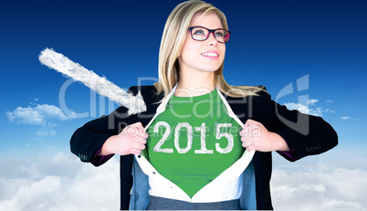 Composite image of businesswoman opening shirt in superhero styl