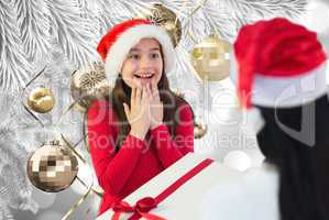 Composite image of little girl getting gift