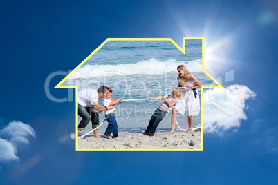 Composite image of cheerful family playing tug of war