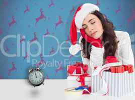 Composite image of brown hair in santa hat napping