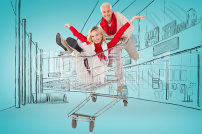 Composite image of happy festive couple messing in trolley