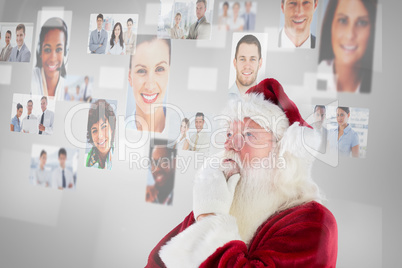 Composite image of santa is thinking about something