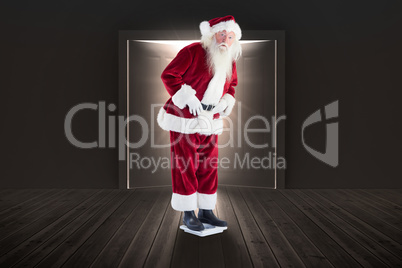 Composite image of santa is surprised about his weight