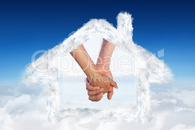 Composite image of loving young couple grasping hands