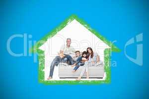 Composite image of family sitting on sofa smiling at camera