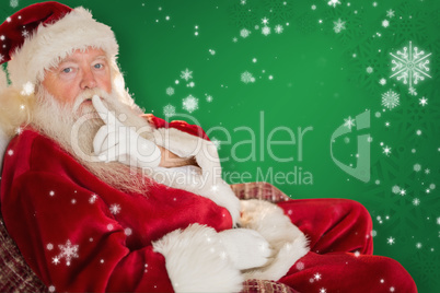 Composite image of santa asking for quiet