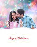 Composite image of happy couple with shopping bags