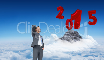 Composite image of thinking businessman