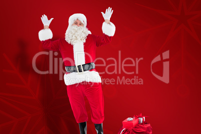Composite image of happy santa claus with sack full of gifts