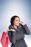 Smiling woman holding shopping bag