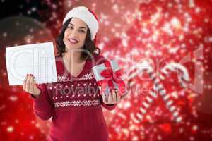 Composite image of brunette holding gift and sale sign