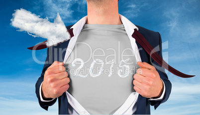 Composite image of businessman opening shirt in superhero style