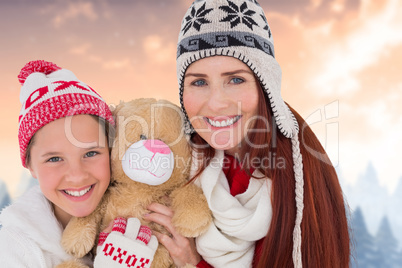 Composite image of mother and daughter with teddy