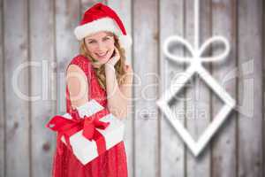 Composite image of cute woman in red dress offering gift