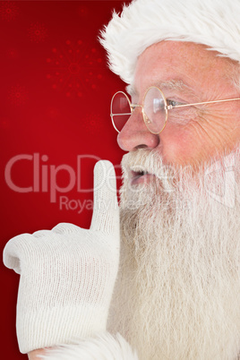 Composite image of santa claus making quiet sign