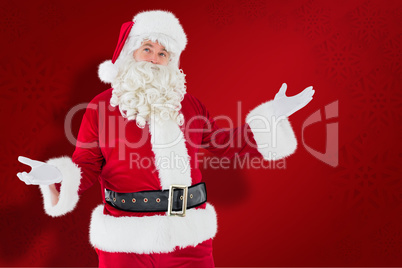 Composite image of father christmas with his hands out