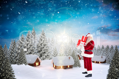 Composite image of santa carries a few presents