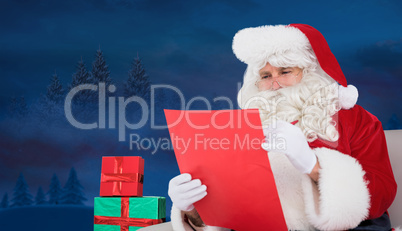 Composite image of santa checking list