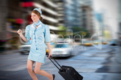 Composite image of pretty air hostess pulling suitcase