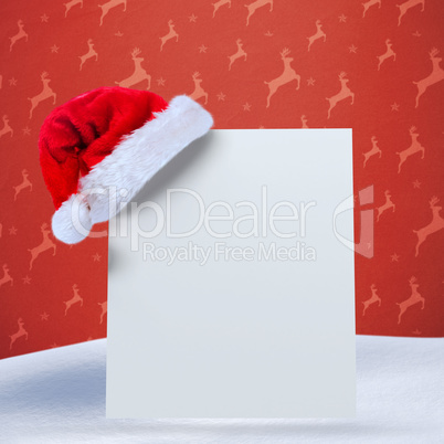 Composite image of santa hat on poster