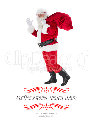 Composite image of santa holding a sack and waving